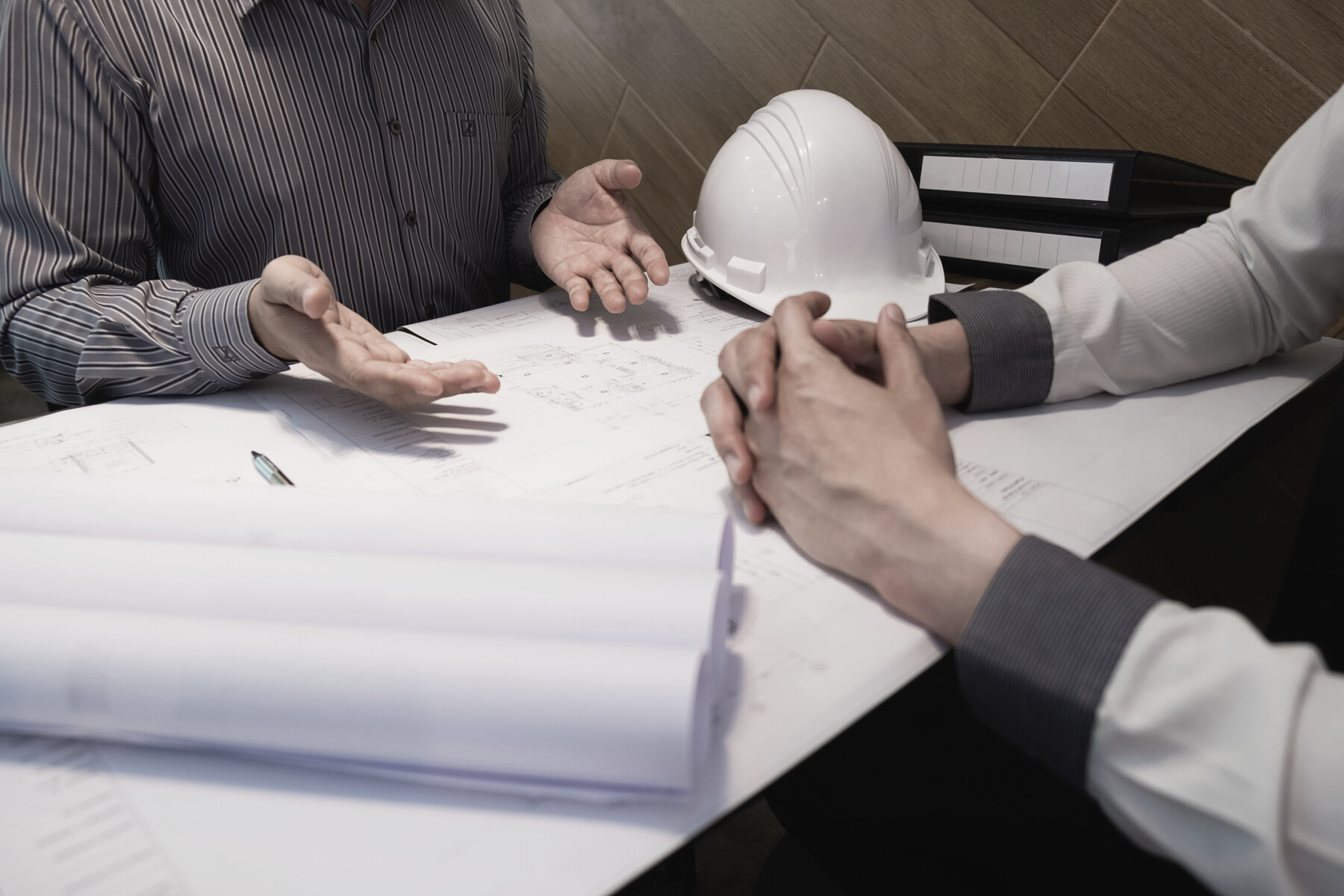 Engineers Discussing about Construction Plan